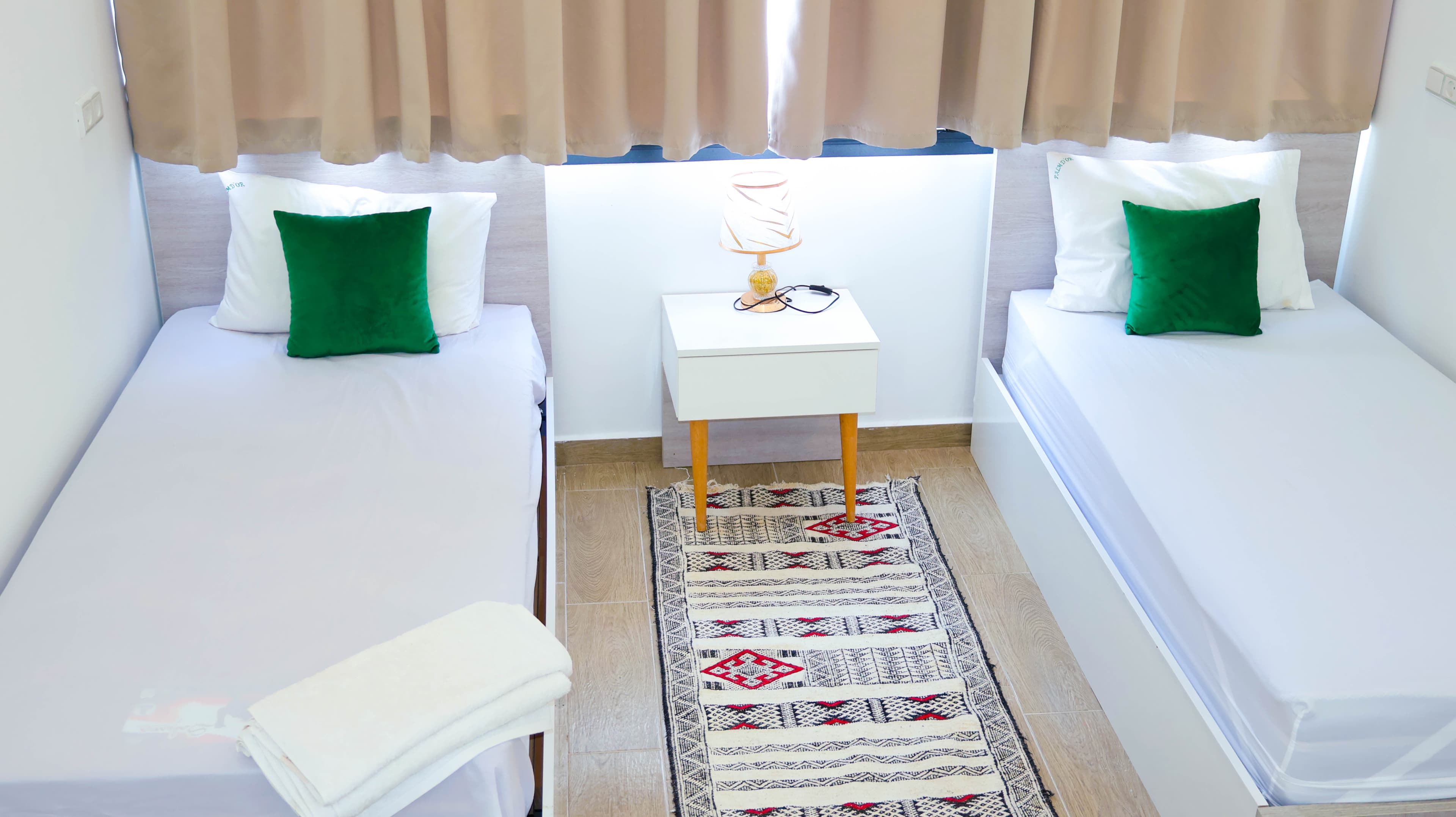 Chambre avec 2 lits d'un appartement Palm d'Or Dakhla