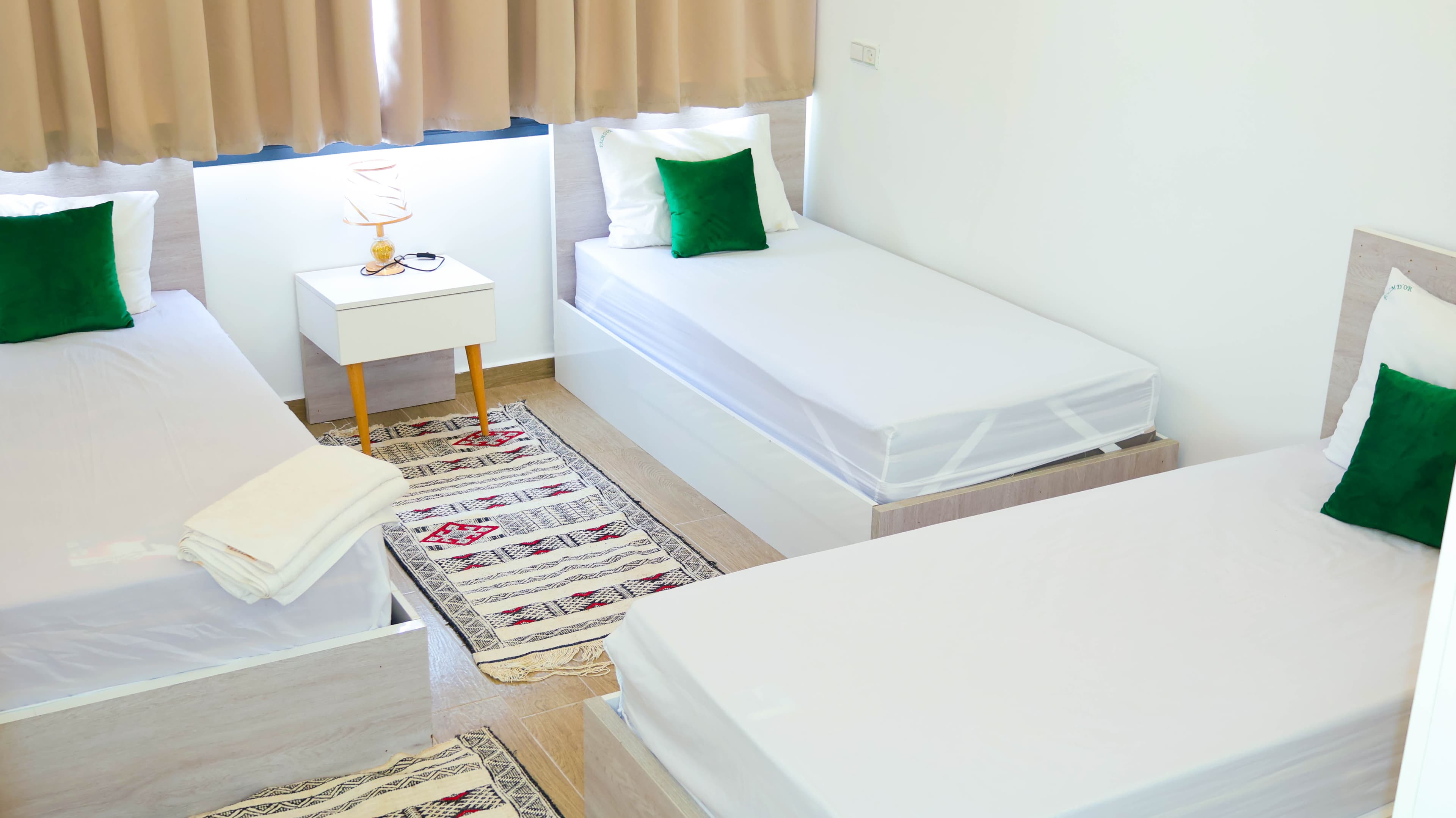 Chambre grande capacité d'un appartement Palm d'Or Dakhla